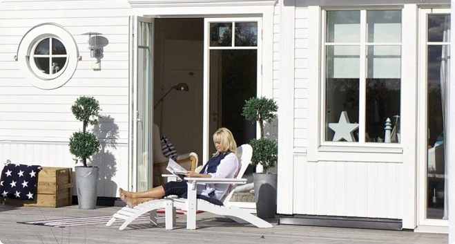 Woman reading on her porch